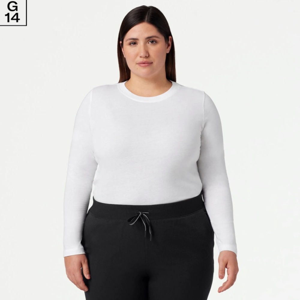 White long sleeve Jaanuu underscrub top